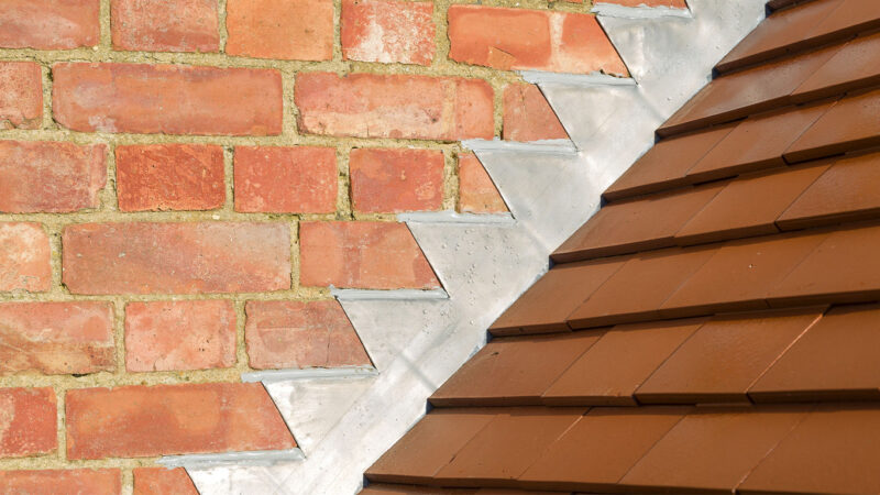 Flashing On Roof Conecting Tile Roofing To Brick
