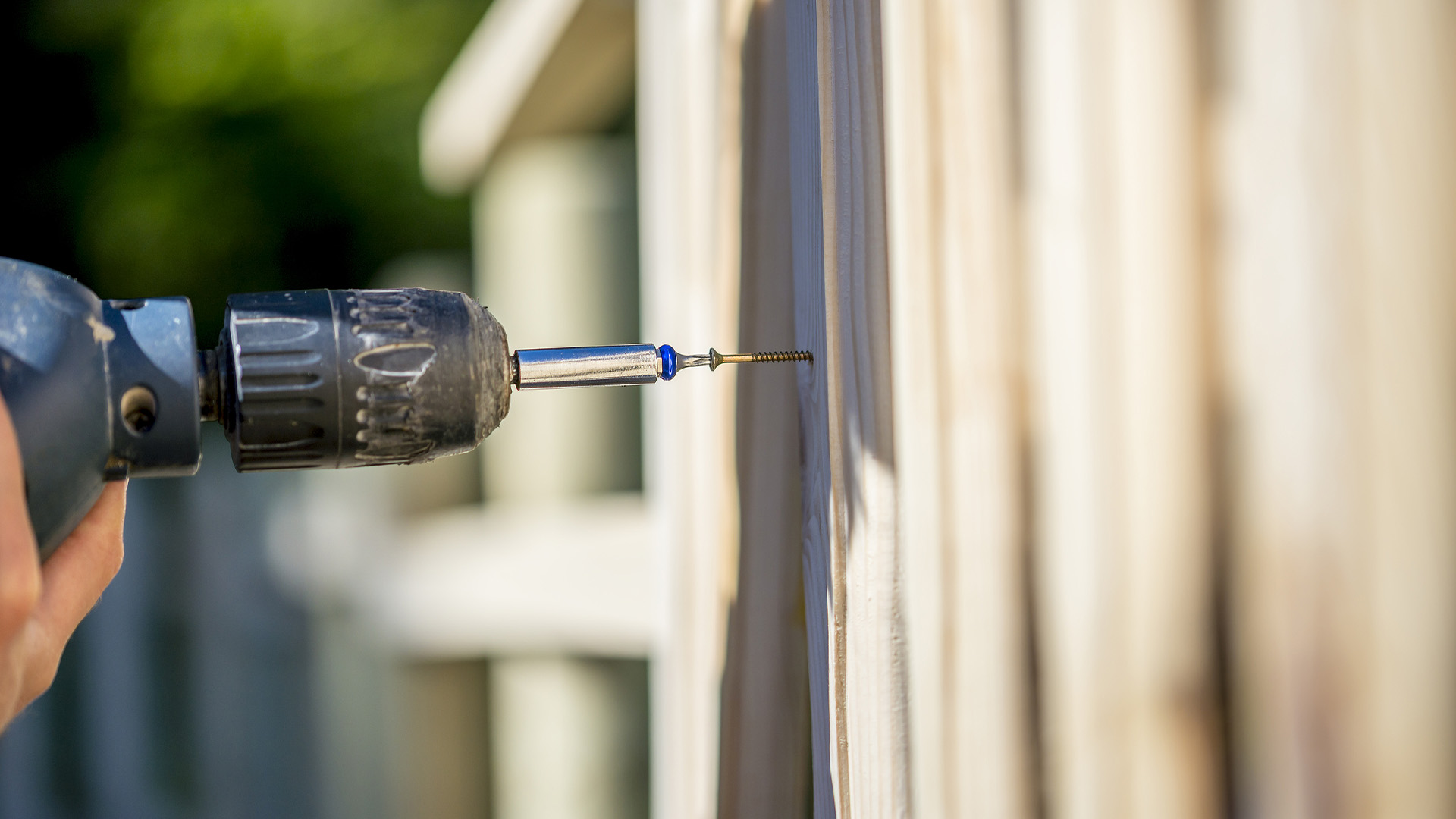 Contractor Installing Residential Fence